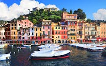 pexels-photo-632523-632523 A vibrant view of the colorful waterfront in Nice, France with boats docked along the sea.