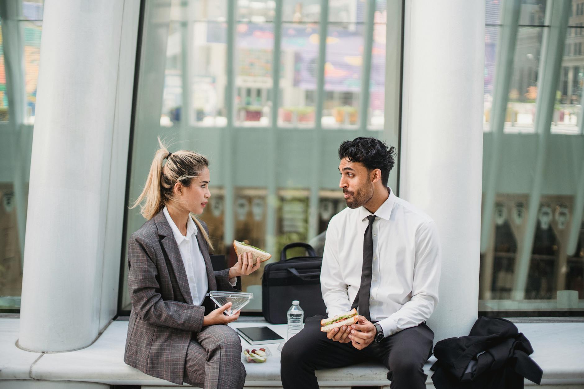 Professionals in a composed meeting or business meal setting in France.