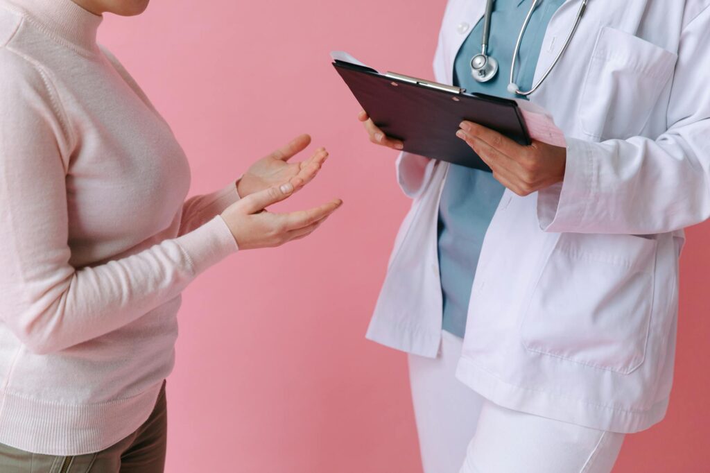 A doctor and patient in a calm consultation room in France.
