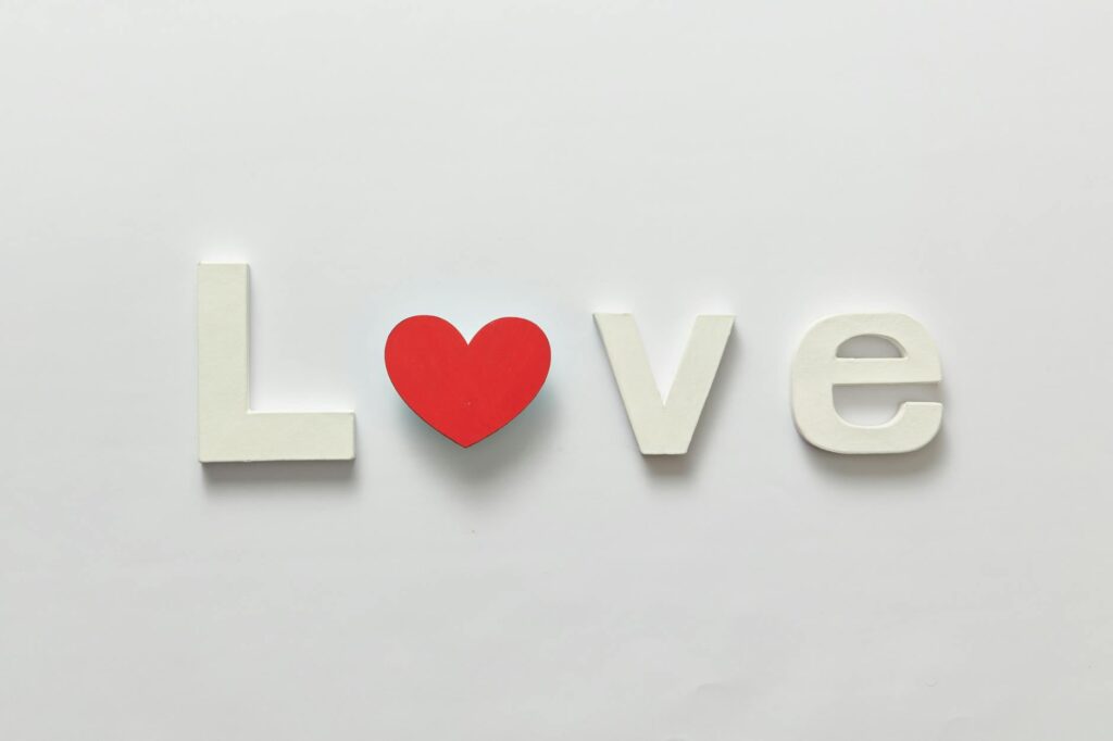 A handwritten card in a tasteful French café setting for Valentine’s Day.