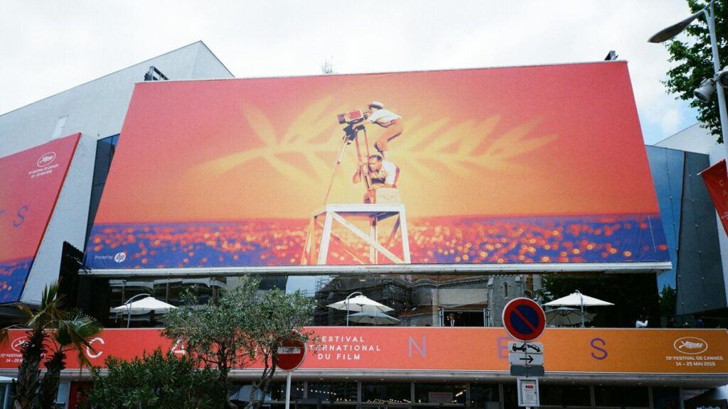 Cannes Film Festival billboard in France for a Feel Good French article about films that inspire moving to France